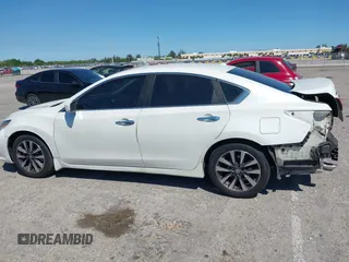 2016 Nissan Altima SV with VIN 1N4AL3AP9GC135114, listed as a IAAI auction lot 41851507 with 127,033 mi miles and . Bid and sale history available at DreamBid. Image 15.