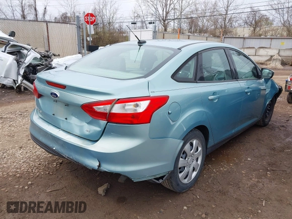 2012 Ford Focus SE with VIN 1FAHP3F24CL336350, listed as a IAAI auction lot 41882948 with 153,238 mi miles. Bid and sale history available at carsss.com. Image 4.