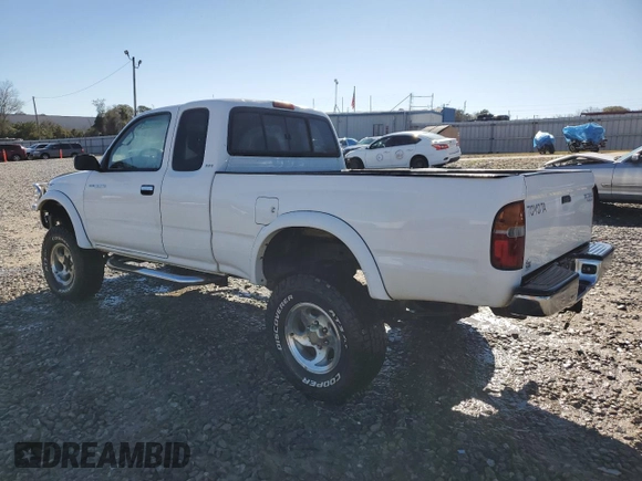 1999 Toyota Tacoma PreRunner with VIN 4TASM92N0XZ559544, listed as a Copart auction lot 86626024 with 209,794 mi miles and Salvage title. Bid and sale history available at DreamBid. Image 2.