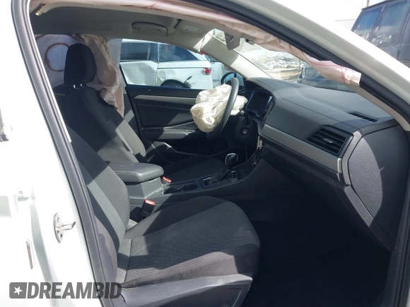 2019 Volkswagen Jetta S with VIN 3VWC57BUXKM064244, listed as a IAAI auction lot 41583654 with 35,970 mi miles and . Bid and sale history available at DreamBid. Image 5.