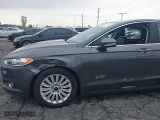 2016 Ford Fusion Energi SE Luxury with VIN 3FA6P0PU6GR165971, listed as a IAAI auction lot 41417233 with 118,240 mi miles. Bid and sale history available at carsss.com. Image 6.