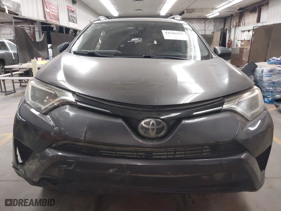 2017 Toyota RAV4 LE with VIN JTMBFREV9HJ132888, listed as a IAAI auction lot 41946329 with 100,982 mi miles. Bid and sale history available at carsss.com. Image 12.