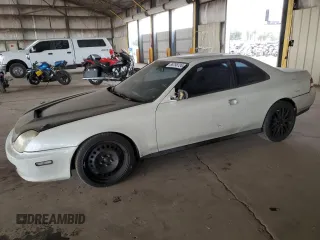 2001 Honda Prelude with VIN JHMBB62411C005163, listed as a Copart auction lot 86798724 with 173,504 mi miles and Clean Title. Bid and sale history available at DreamBid. Image 1.