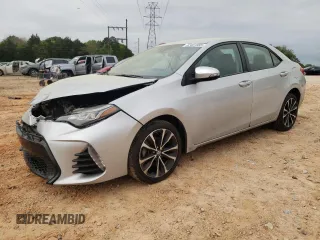 2019 Toyota Corolla L with VIN 5YFBURHE5KP910088, listed as a Copart auction lot 52401885 with 130,124 mi miles and Salvage Title. Bid and sale history available at DreamBid. Image 1.