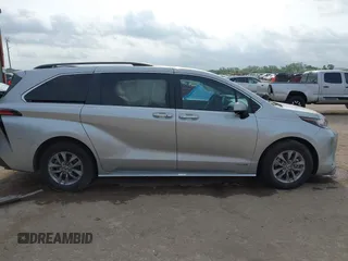 2021 Toyota Sienna XLE with VIN 5TDYRKEC9MS041334, listed as a IAAI auction lot 42145698 with 117,229 mi miles and . Bid and sale history available at DreamBid. Image 13.