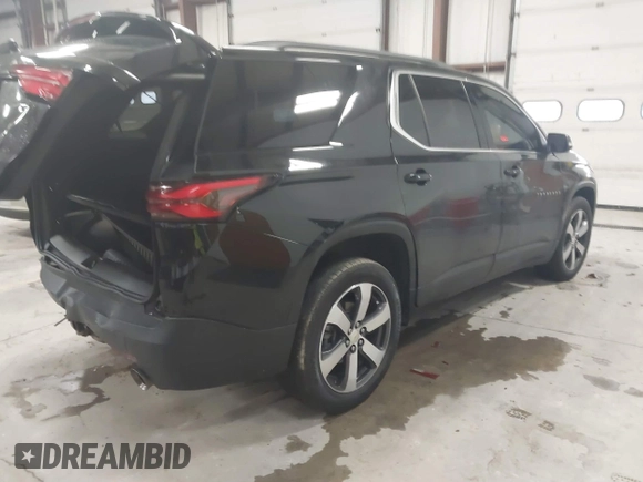 2022 Chevrolet Traverse LT with VIN 1GNEVHKW3NJ124361, listed as a IAAI auction lot 41033053 with 27,869 mi miles and . Bid and sale history available at DreamBid. Image 4.