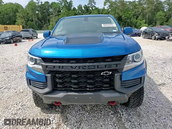 2021 Chevrolet Colorado 4WD ZR2 z VIN 1GCGTEEN7M1157788, wystawiony jako Copart lot #58042845 z przebiegiem 49 008 mil mil oraz Szkoda całkowita • Salvage title. Historia ofert i sprzedaży dostępna na DreamBid. Obrazek 13.