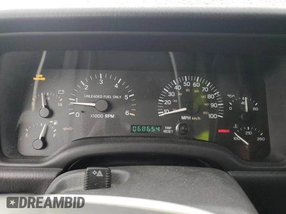 1999 Jeep Cherokee Sport with VIN 1J4FF68S7XL560943, listed as a Copart auction lot 58425505 with 68,654 mi miles and Salvage title. Bid and sale history available at DreamBid. Image 9.