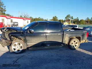 2015 Chevrolet Silverado 1500 LTZ with VIN 3GCUKSEJXFG489780, listed as a IAAI auction lot 41335608 with 140,972 mi miles. Bid and sale history available at carsss.com. Image 14.