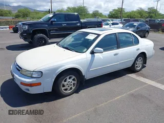 1998 Nissan Maxima GXE z VIN JN1CA21D6WT510015, wystawiony jako IAAI lot #42004731 z przebiegiem 114 575 mil mil oraz . Historia ofert i sprzedaży dostępna na DreamBid. Obrazek 2.