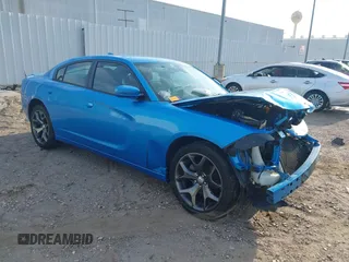 2015 Dodge Charger SXT z VIN 2C3CDXHG0FH907089, wystawiony jako IAAI lot #42033569 z przebiegiem 151 100 mil mil oraz . Historia ofert i sprzedaży dostępna na DreamBid. Obrazek 1.