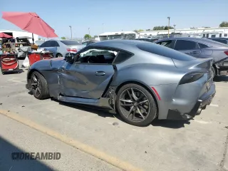 2021 Toyota GR Supra 3.0 with VIN WZ1DB0C01MW042477, listed as a Copart auction lot 70084924 with 59,925 mi miles and Salvage Title. Bid and sale history available at carsss.com. Image 2.