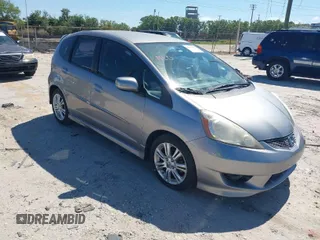 2009 Honda Fit Sport w/Navi with VIN JHMGE886X9S055014, listed as a IAAI auction lot 41847661 with 54,234 mi miles. Bid and sale history available at carsss.com. Image 1.