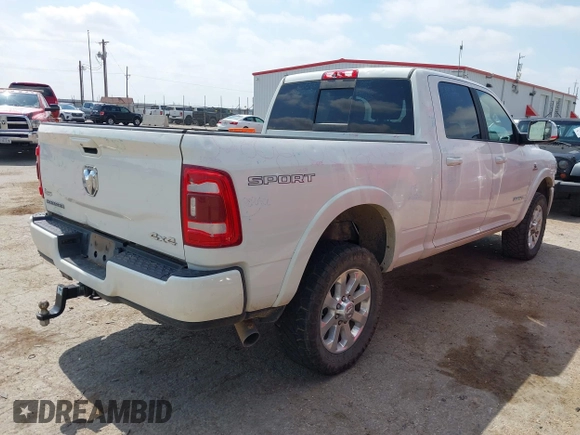 2022 Ram 2500 Laramie with VIN 3C6UR5FL0NG143918, listed as a IAAI auction lot 42373907 with 91,918 mi miles and . Bid and sale history available at DreamBid. Image 4.