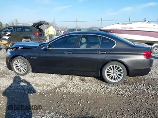 2014 BMW 5 Series 528i xDrive with VIN WBA5A7C54ED616297, listed as a IAAI auction lot 41877809 with 147,874 mi miles and . Bid and sale history available at DreamBid. Image 14.