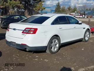2014 Ford Taurus SEL with VIN 1FAHP2E88EG127074, listed as a IAAI auction lot 41688975 with 186,650 mi miles. Bid and sale history available at carsss.com. Image 4.