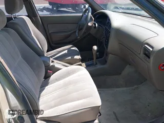 1996 Toyota Camry DX z VIN JT2BG12K3T0381929, wystawiony jako IAAI lot #42336120 z przebiegiem 198 942 mil mil oraz . Historia ofert i sprzedaży dostępna na DreamBid. Obrazek 5.