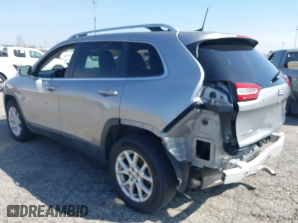 2016 Jeep Cherokee Latitude z VIN 1C4PJMCS5GW243746, wystawiony jako IAAI lot #41346904 z przebiegiem 98 616 mil mil oraz . Historia ofert i sprzedaży dostępna na DreamBid. Obrazek 3.
