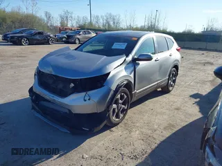 2018 Honda CR-V EX with VIN 7FARW2H56JE097214, listed as a IAAI auction lot 42061999 with 74,862 mi miles and . Bid and sale history available at DreamBid. Image 18.