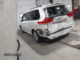 2011 Toyota Sienna XLE AAS with VIN 5TDYK3DC9BS091563, listed as a IAAI auction lot 41393689 with 229,663 mi miles and . Bid and sale history available at DreamBid. Image 3.