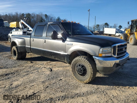 2002 Ford F-350 XL z VIN 1FTWW33F22EC09806, wystawiony jako Copart lot #87634095 z przebiegiem Nie podano mil oraz Czysty tytuł • Clean title. Historia ofert i sprzedaży dostępna na DreamBid. Obrazek 4.