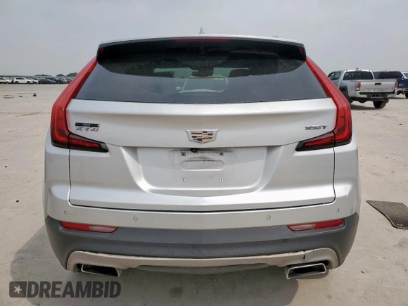 2020 Cadillac XT4 FWD Premium Luxury z VIN 1GYFZCR42LF115413, wystawiony jako Copart lot #56746785 z przebiegiem 41 296 mil mil oraz Szkody całkowita. Historia ofert i sprzedaży dostępna na DreamBid. Obrazek 6.