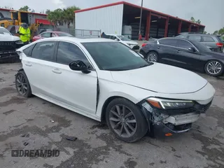 2022 Honda Civic EX with VIN JHMFE1F74NX003499, listed as a IAAI auction lot 42616329 with 71,020 mi miles and . Bid and sale history available at DreamBid. Image 1.