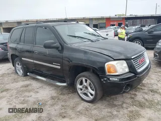 2006 GMC Envoy SLT with VIN 1GKDS13S462241866, listed as a IAAI auction lot 41943322 with 90,695 mi miles. Bid and sale history available at carsss.com. Image 1.