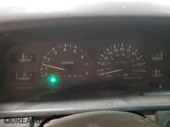 1993 Toyota T100 DX z VIN JT4VD10A0P0013396, wystawiony jako Copart lot #43002405 z przebiegiem 137 000 mil mil oraz Szkoda całkowita • Salvage title. Historia ofert i sprzedaży dostępna na DreamBid. Obrazek 9.