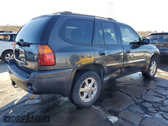 2007 GMC Envoy SLE with VIN 1GKDT13S572183409, listed as a Copart auction lot 76072734 with 165,362 mi miles and Salvage Title. Bid and sale history available at carsss.com. Image 3.