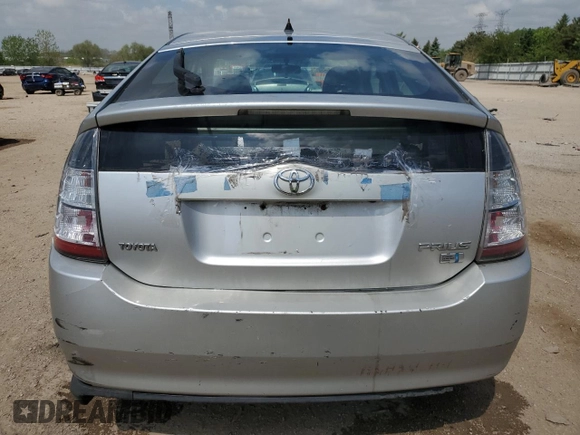 2004 Toyota Prius z VIN JTDKB20UX40033028, wystawiony jako Copart lot #57032515 z przebiegiem 279 143 mil mil oraz Szkoda całkowita • Salvage title. Historia ofert i sprzedaży dostępna na DreamBid. Obrazek 6.