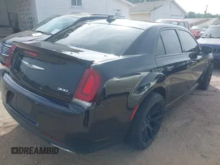2018 Chrysler 300 S with VIN 2C3CCAGG9JH300487, listed as a IAAI auction lot 42501287 with 273,751 mi miles and . Bid and sale history available at DreamBid. Image 4.