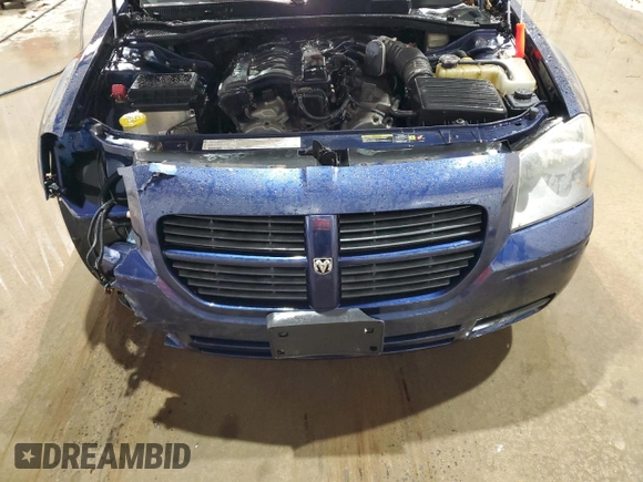 2005 Dodge Magnum SXT z VIN 2D4GZ48V95H537435, wystawiony jako Copart lot #74198134 z przebiegiem 84 164 mil mil oraz Szkoda całkowita • Salvage title. Historia ofert i sprzedaży dostępna na DreamBid. Obrazek 11.