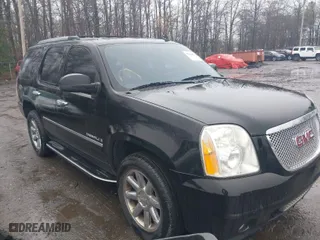 2009 GMC Yukon Denali with VIN 1GKFK03229R276923, listed as a IAAI auction lot 39128547 with 214,430 mi miles. Bid and sale history available at carsss.com. Image 1.
