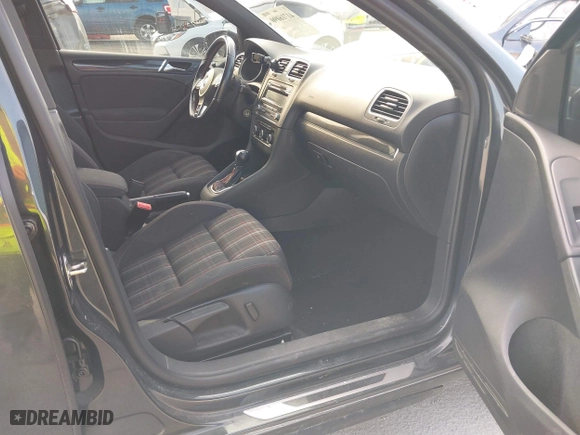 2013 Volkswagen GTI with VIN WVWHV7AJ2DW129476, listed as a IAAI auction lot 41716090 with 132,996 mi miles. Bid and sale history available at carsss.com. Image 5.