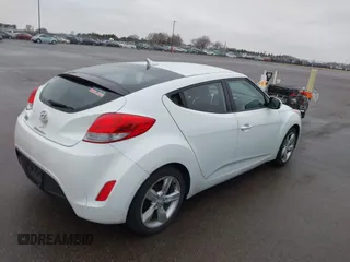 2013 Hyundai Veloster w/Gray Int with VIN KMHTC6AD8DU171050, listed as a IAAI auction lot 41992468 with 186,714 mi miles and . Bid and sale history available at DreamBid. Image 4.