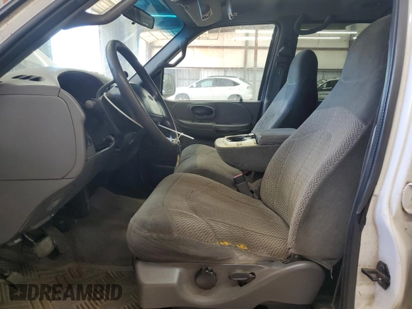 2001 Ford F-150 XLT with VIN 1FTRW07W51KE03221, listed as a Copart auction lot 63628855 with 237,510 mi miles and Salvage title. Bid and sale history available at DreamBid. Image 7.