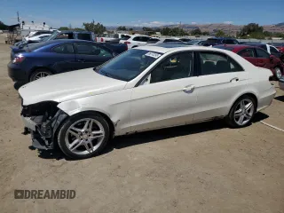 2014 Mercedes-Benz E 350 Sport with VIN WDDHF5KB0EA821510, listed as a Copart auction lot 66010395 with 84,710 mi miles and Salvage title. Bid and sale history available at DreamBid. Image 1.