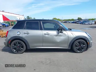 2019 MINI Hardtop 4 Door Cooper S with VIN WMWXU3C5XK2H55160, listed as a IAAI auction lot 42024249 with 49,944 mi miles and . Bid and sale history available at DreamBid. Image 13.