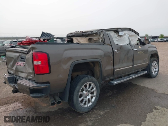 2015 GMC Sierra 1500 Denali z VIN 3GTU2WEJ6FG174160, wystawiony jako IAAI lot #40118246 z przebiegiem Nie podano mil oraz . Historia ofert i sprzedaży dostępna na DreamBid. Obrazek 4.
