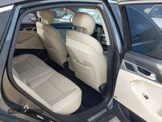 2017 Genesis G80 5.0L Ultimate with VIN KMHGN4JF0HU207725, listed as a IAAI auction lot 40953010 with 84,738 mi miles. Bid and sale history available at carsss.com. Image 8.