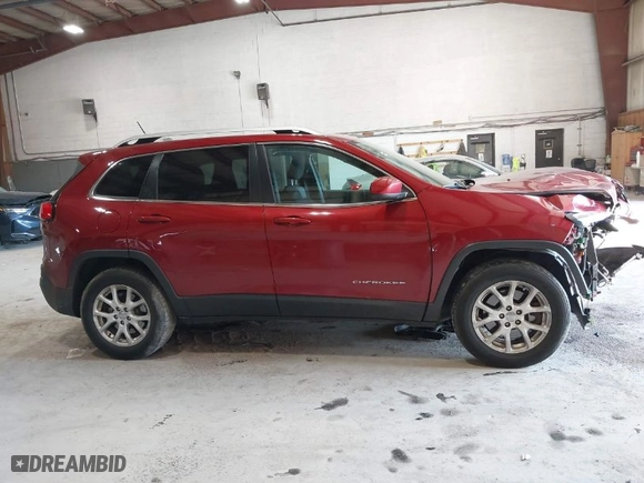 2014 Jeep Cherokee Latitude with VIN 1C4PJMCS9EW310314, listed as a IAAI auction lot 41759493 with 151,335 mi miles. Bid and sale history available at carsss.com. Image 14.