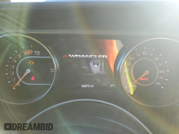 2023 Jeep Wrangler Willys with VIN 1C4HJXDG1PW527567, listed as a Copart auction lot 42218255 with 43,273 mi miles and Salvage Title. Bid and sale history available at DreamBid. Image 9.