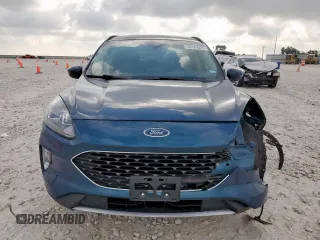 2020 Ford Escape SEL с VIN 1FMCU9H69LUB21780, выставлен на аукционе Copart как лот 58129025 с пробегом 69 511 миль миль и Списание • Salvage title. История ставок и продаж доступна на DreamBid. Изображение 5.
