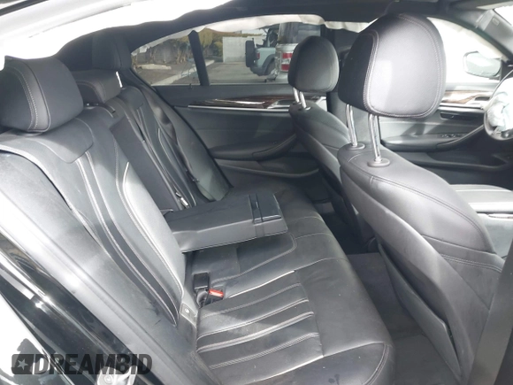 2019 BMW 5 Series 530e with VIN WBAJA9C52KB399480, listed as a IAAI auction lot 41714228 with 90,435 mi miles and . Bid and sale history available at DreamBid. Image 8.