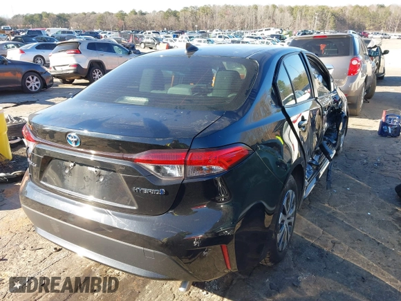 2022 Toyota Corolla Hybrid LE with VIN JTDEAMDE2NJ039206, listed as a IAAI auction lot 41592129 with 97,593 mi miles. Bid and sale history available at carsss.com. Image 4.