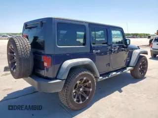 2013 Jeep Wrangler Unlimited Sport with VIN 1C4HJWDG2DL620654, listed as a Copart auction lot 52704645 with 133,932 mi miles and Clean title. Bid and sale history available at DreamBid. Image 3.