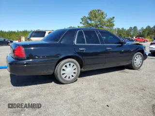 2008 Ford Police Interceptor с VIN 2FAFP71V98X178713, выставлен на аукционе Copart как лот 48131715 с пробегом 125 996 миль миль и Списание • Salvage title. История ставок и продаж доступна на DreamBid. Изображение 3.
