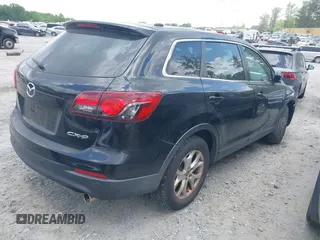 2013 Mazda CX-9 Touring with VIN JM3TB2CA4D0404858, listed as a IAAI auction lot 42164199 with 177,463 mi miles and . Bid and sale history available at DreamBid. Image 4.