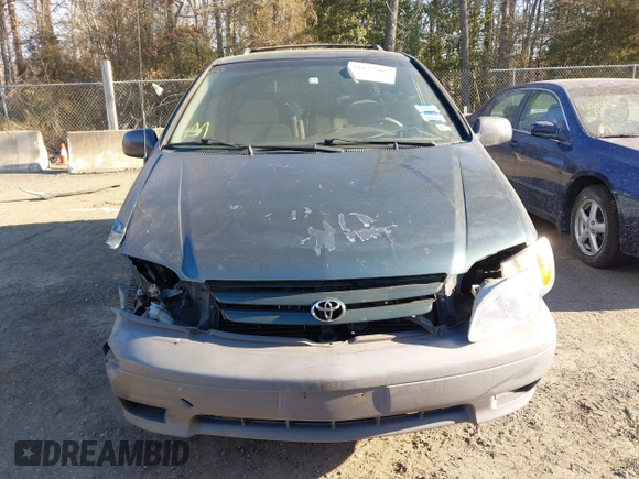 2001 Toyota Sienna LE z VIN 4T3ZF13C51U324527, wystawiony jako IAAI lot #41622465 z przebiegiem 145 450 mil mil oraz . Historia ofert i sprzedaży dostępna na DreamBid. Obrazek 12.
